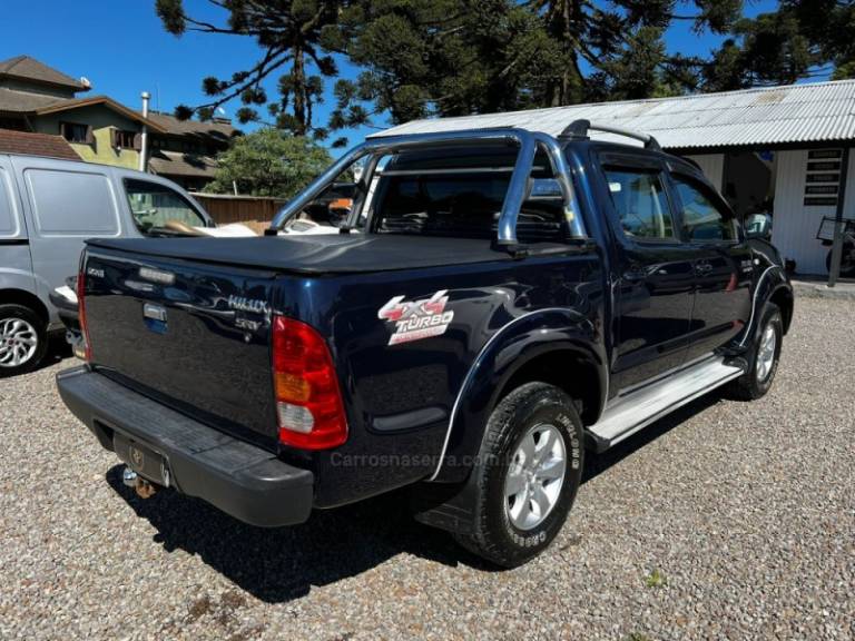 TOYOTA - HILUX - 2009/2009 - Azul - R$ 106.900,00