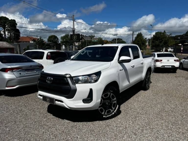 TOYOTA - HILUX - 2021/2021 - Branca - R$ 174.900,00