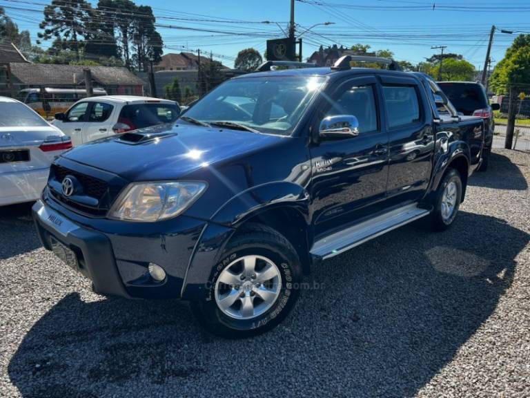 TOYOTA - HILUX - 2009/2009 - Azul - R$ 106.900,00
